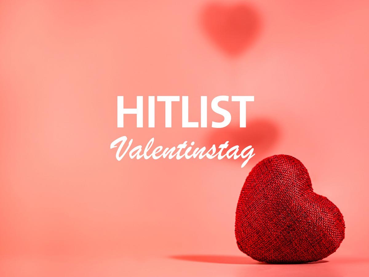 Grafik zum Valentinstag mit einem roten Herz auf rosa Grund